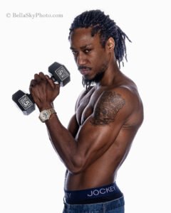 black male with dumbbell fitness portrait